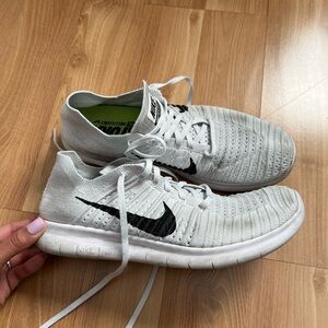 white/grey Nike flynits